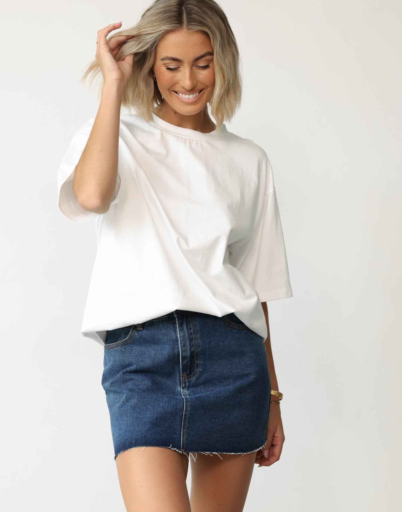 Rowan Denim Mini Skirt (Dark Denim) | CHARCOAL Exclusive - Frayed Edge Denim Mini Skirt - Women's Skirt - Charcoal Clothing