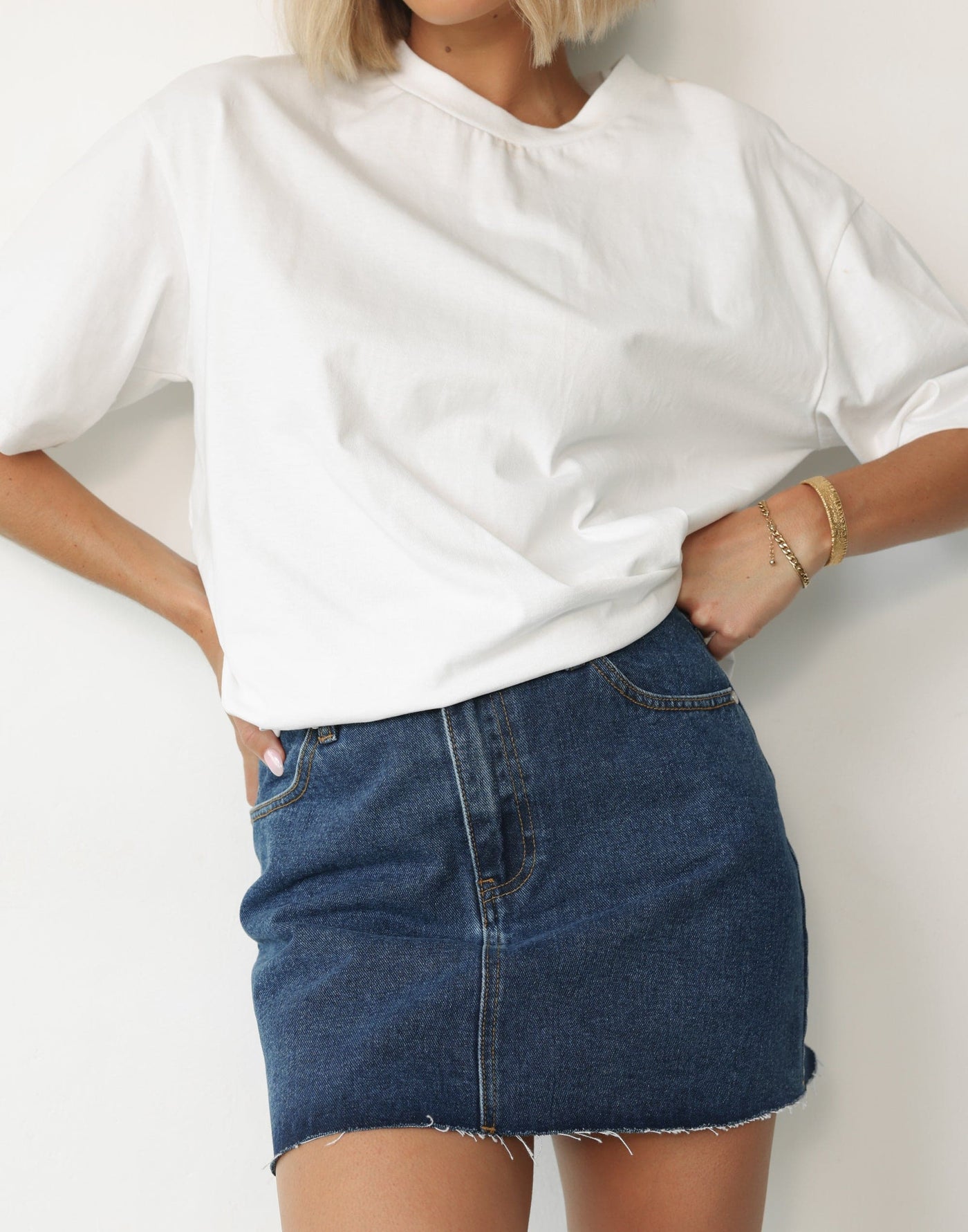 Rowan Denim Mini Skirt (Dark Denim) | CHARCOAL Exclusive - Frayed Edge Denim Mini Skirt - Women's Skirt - Charcoal Clothing